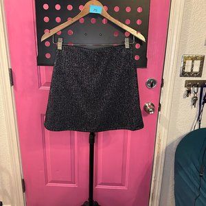 Urban Outfitters- Mini skirt. Silver vertical stripes, spandex/ polyester blend